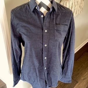 Descendent of Thieves denim blue colored shirt
